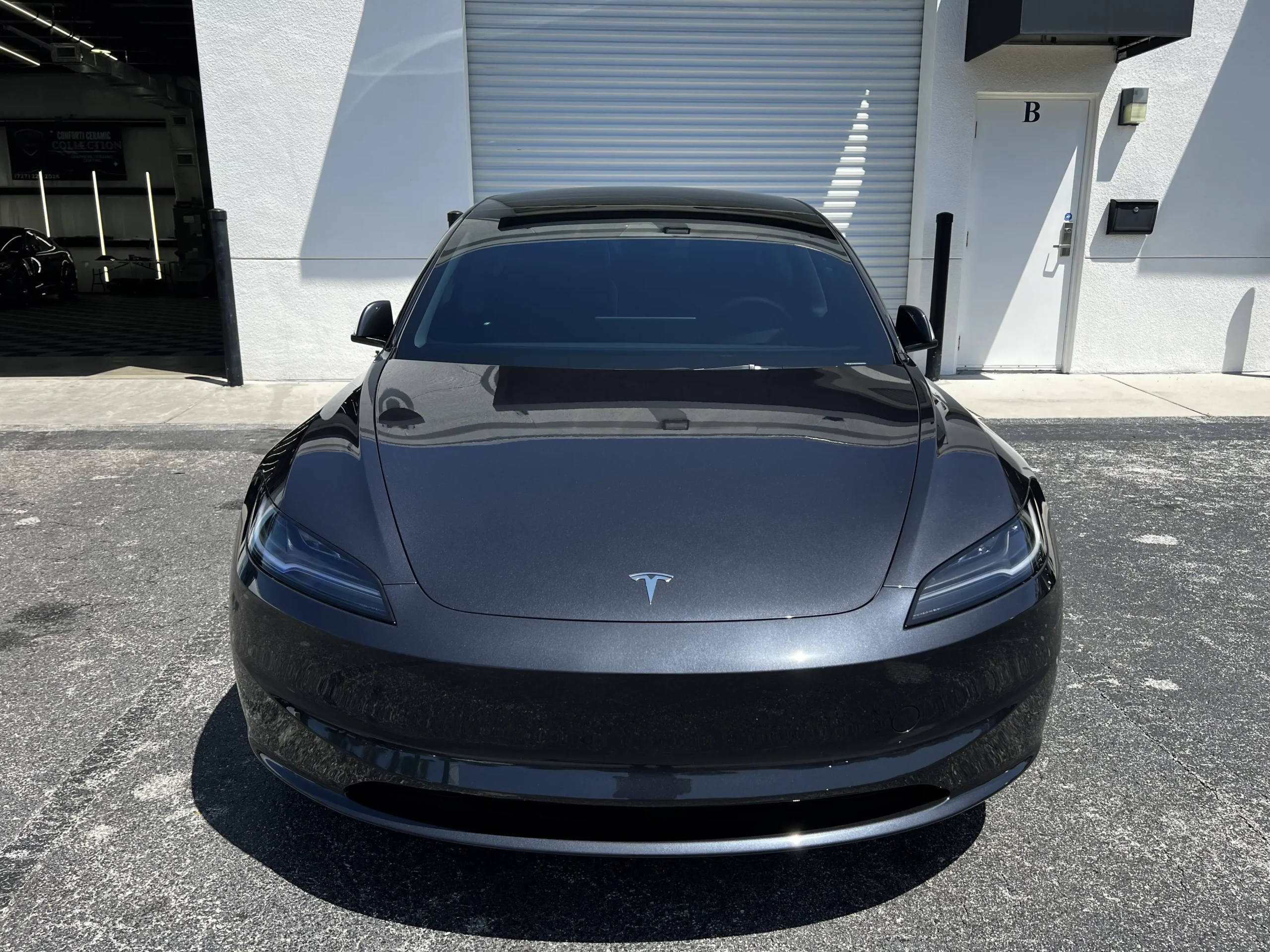 Tesla with brand new window tint from Conforti Detailing