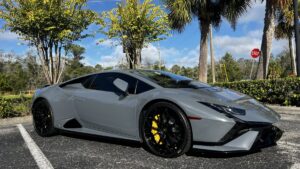 Gray Lamborghini Huracan with black wheels and PPF Tampa protection in parking lot