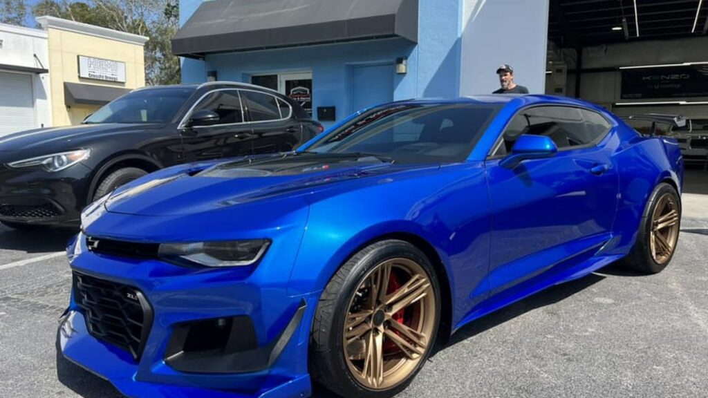 Blue Chevrolet Camaro with a ceramic coating at Conforti Auto & Marine Detailing in Palm Harbor, FL