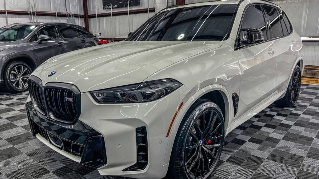 Gray BMW SUV with a long-lasting ceramic coating at Conforti Auto & Marine Detailing in Palm Harbor, FL