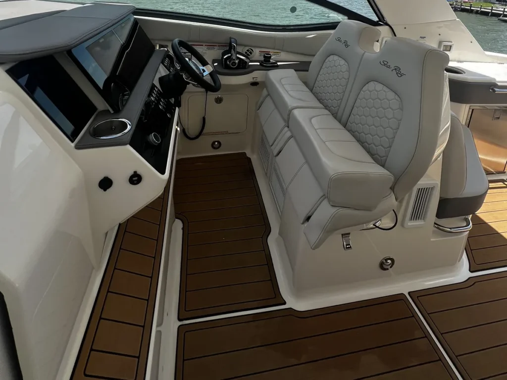 Sea Ray cockpit, helm and teak sole detailed by Conforti Auto & Marine Detailing