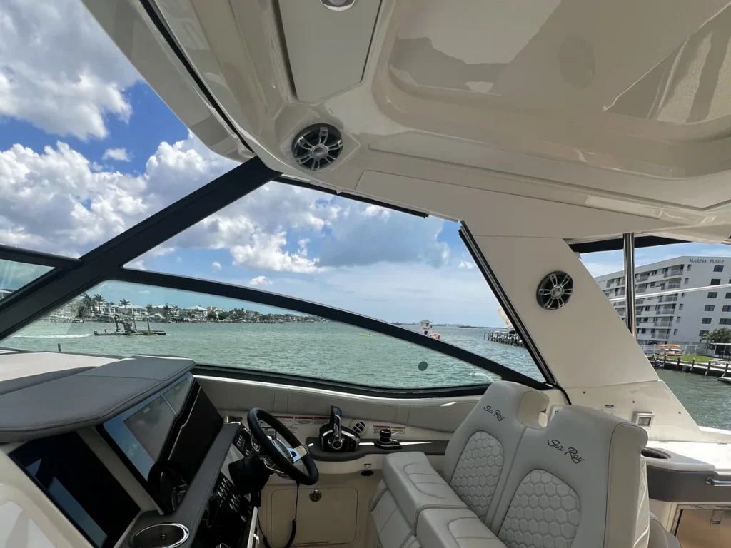 Sea Ray hardtop and windshield under Florida sun, the UV load a marine coating has to survive