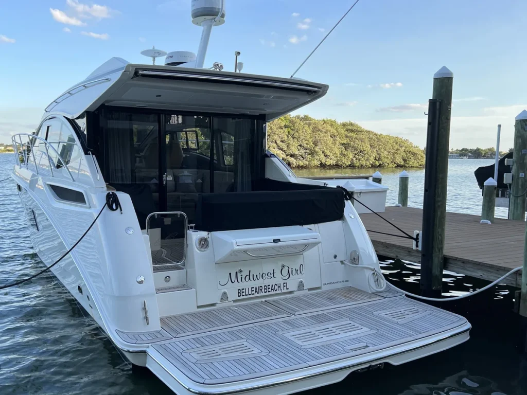 Stern and teak swim platform of a Sea Ray Sundancer, coated by Conforti Detailing